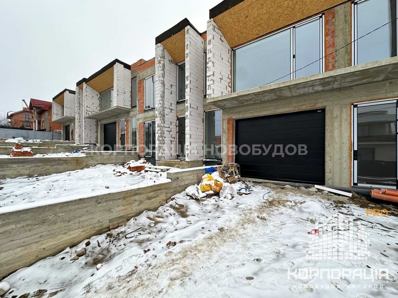 Продаж котеджу з гаражем; відеодомофон, панорамний вид на місто