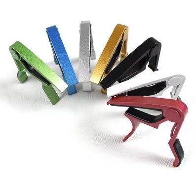 Capo (transpositor) Para Guitarra