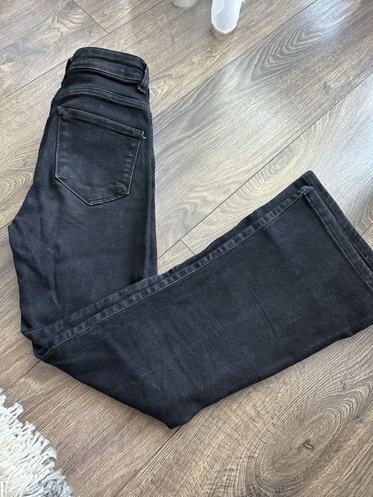 Джинси чорні кльош