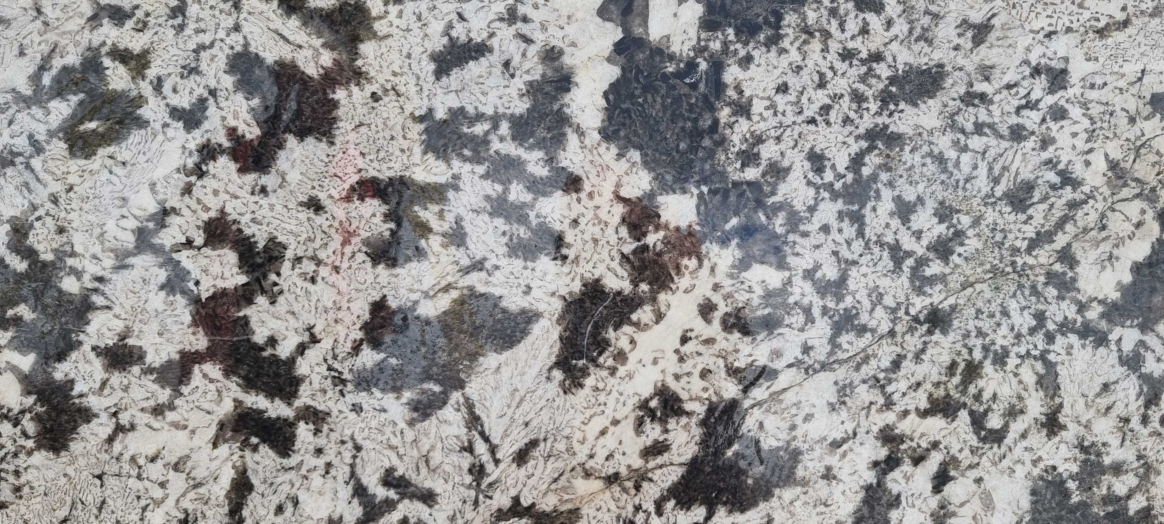 Граніт Aspen White в блоках.
