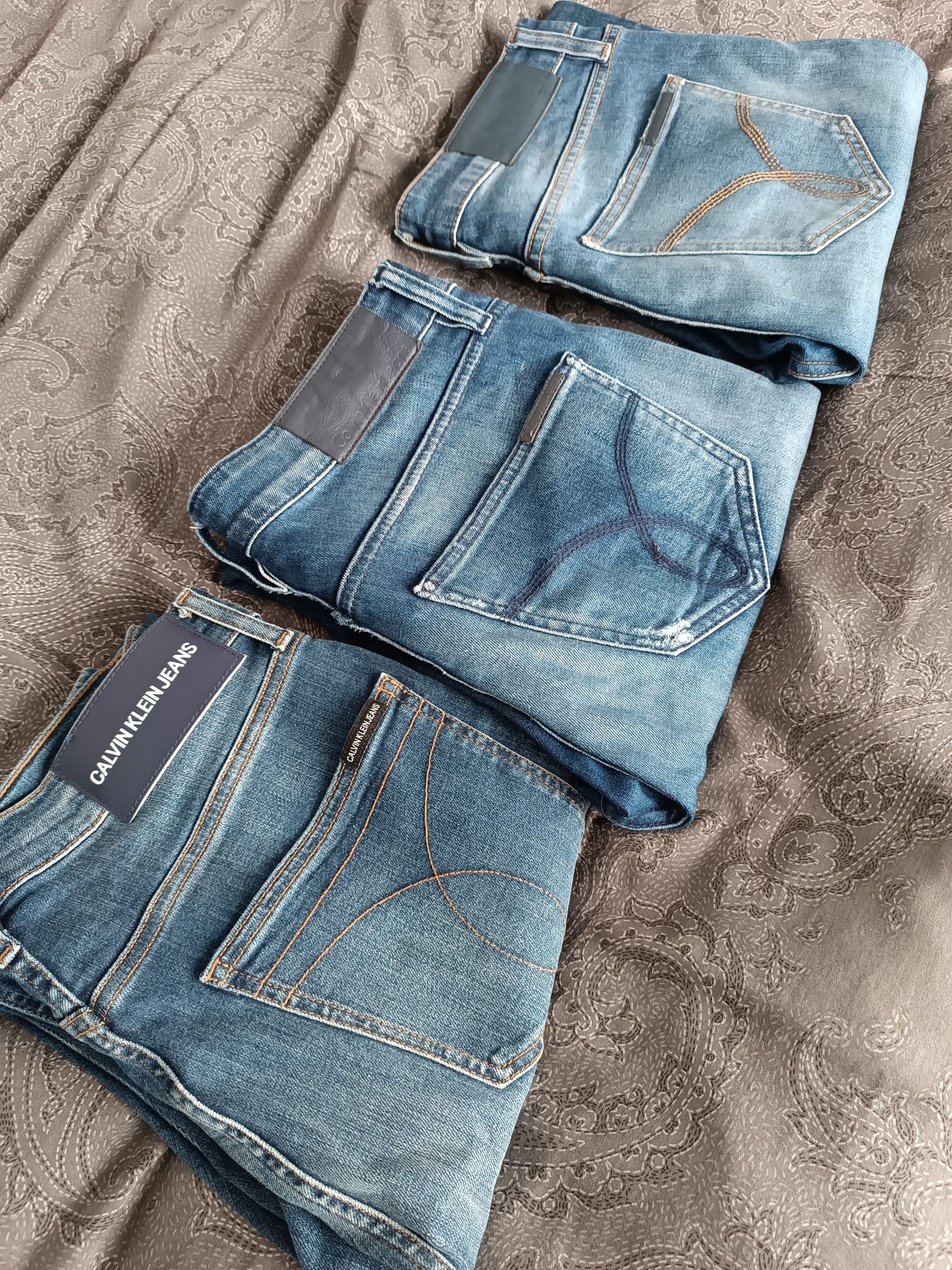 Spodnie Cavin Klein Jeans rozm W 31 L 34 trzy pary