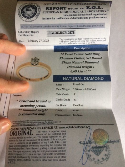 Złoty pierścionek zaręczynowy 585 diament 0.09ct., r.14