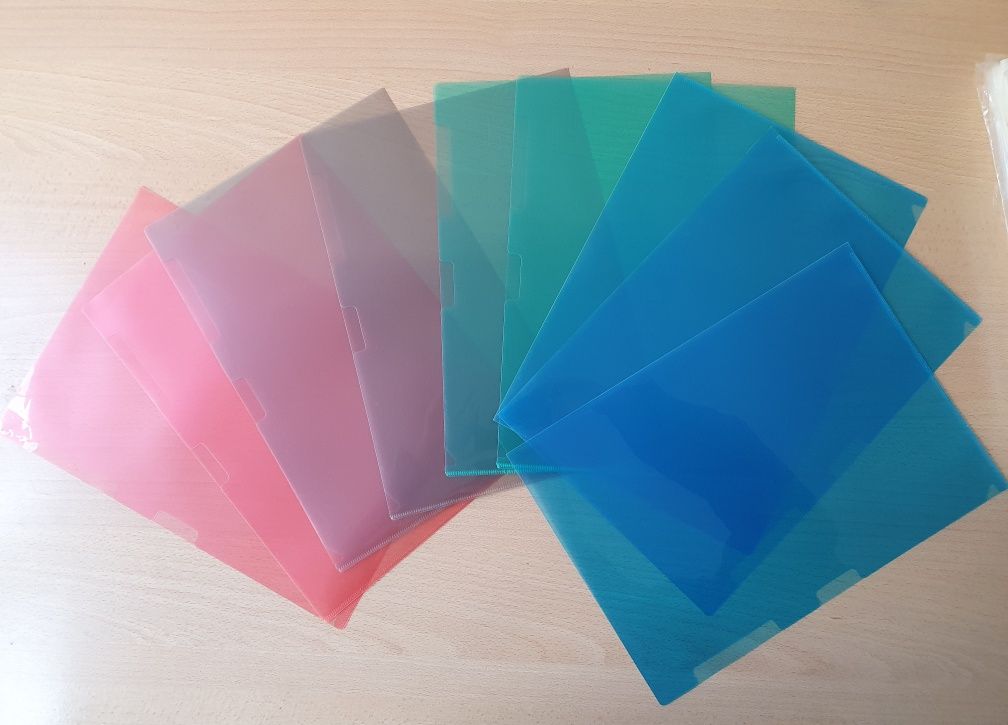 Нові пластикові конверти (файли) формату А4 (прозорі та кольорові)