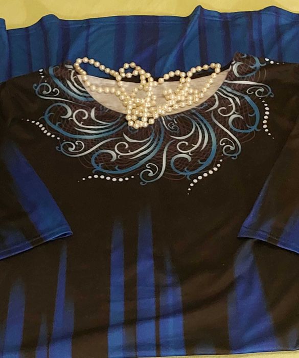 Niebieska zwiewna sukienka dla Pań rozmiar 46