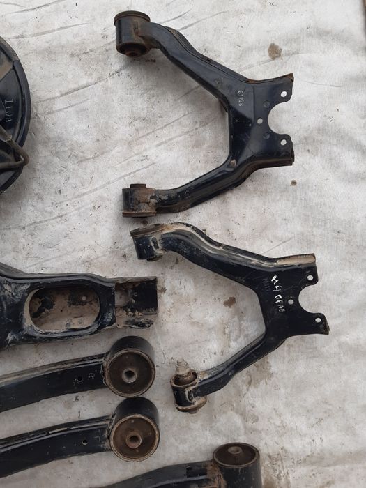 Цапфа Mitsubishi Paqero Wagon 4 3.0  поворотний кулак ричаг задній