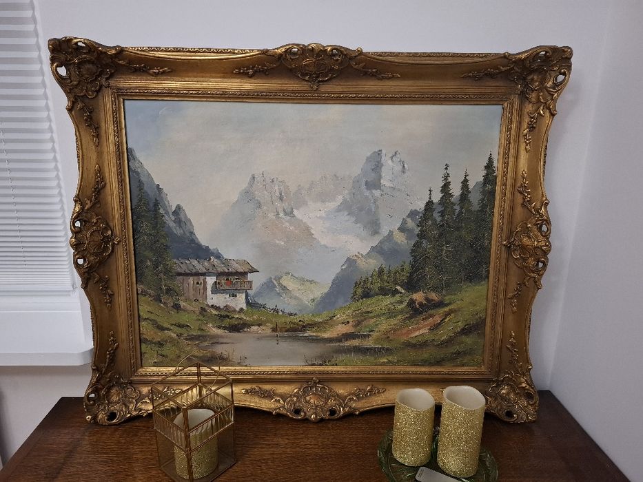 Piękny duży obraz w złotej ramie