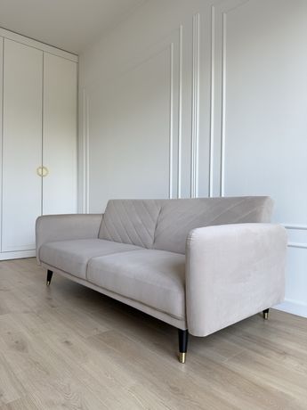 Sofa rozkładana SENJA Belliani welur szampański beż czarne złote nogi