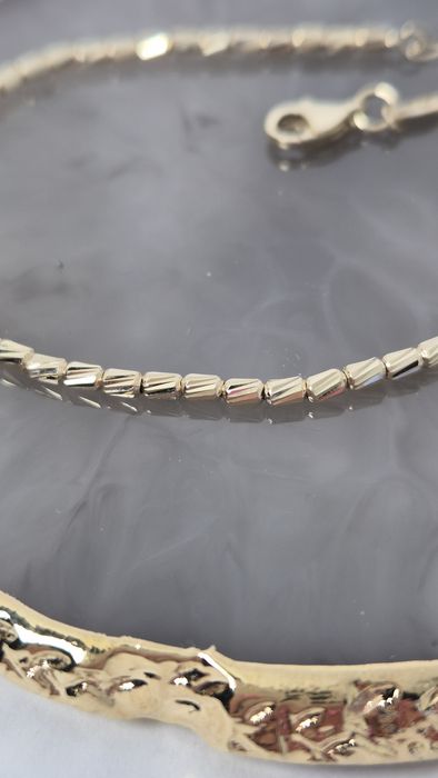 Nowa złota bransoletka, ruchoma, nietypowy splot,sztywna, 585