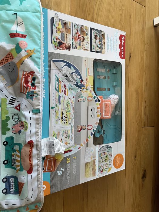 Mata edukacyjna wesołe miasteczko fisher Price