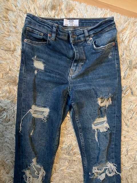 Spodnie jeansy BERSHKA jak nowe roz. 34