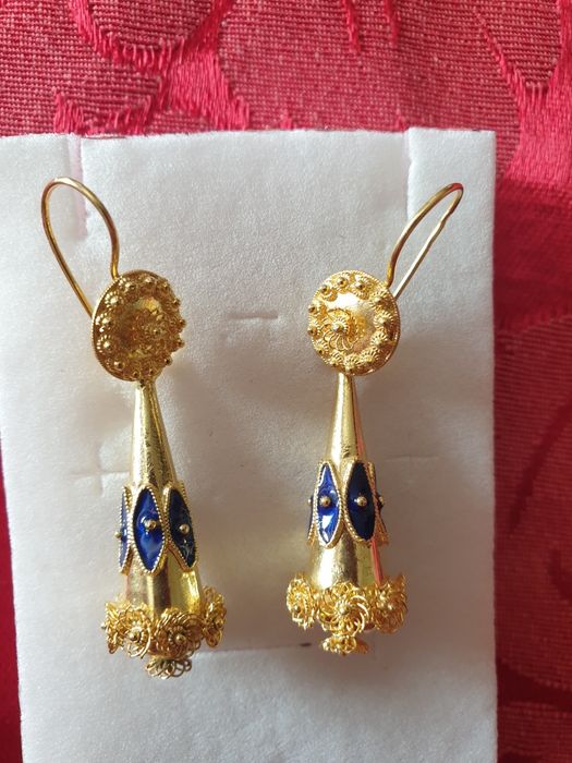 Brincos fuso prata dourada