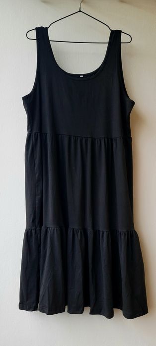 Duża sukienka, szyta w literę A