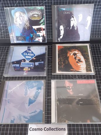 CDs Van Halen, the Clash, Madonna, Joe Cocker, Bryan Adams