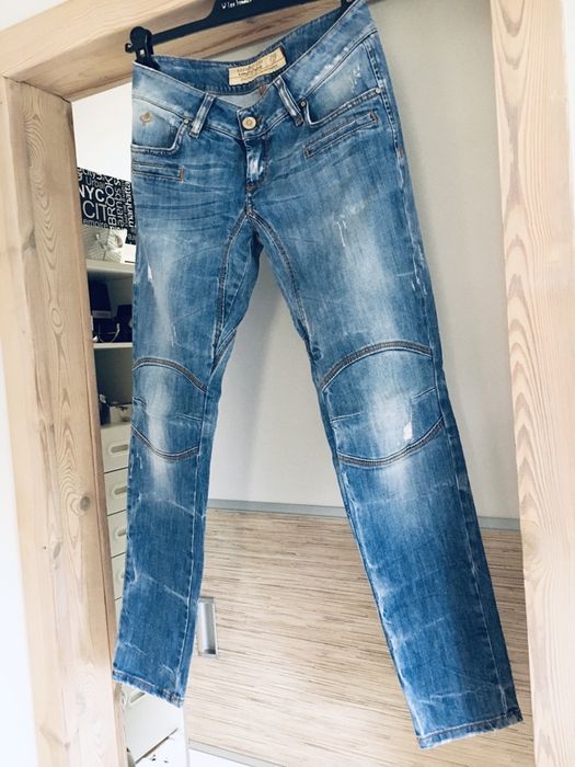 Spodnie jeansy wloskie Rossodisera