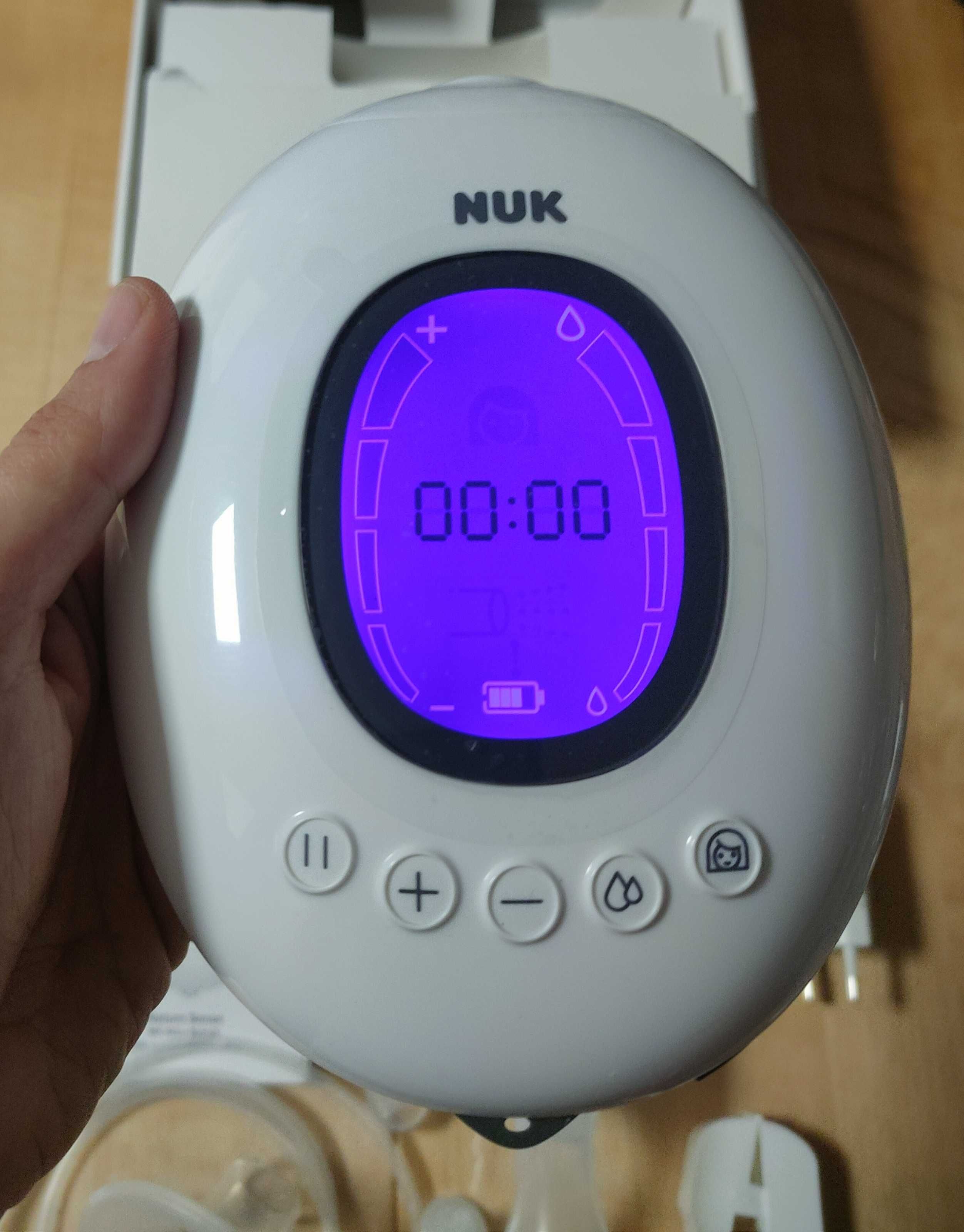 Bomba tirar leite NUK - praticamente nova