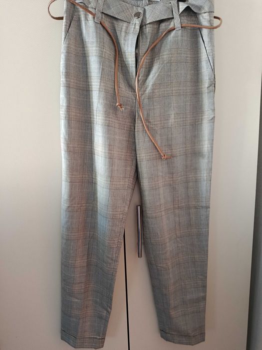 штани нові в клітку