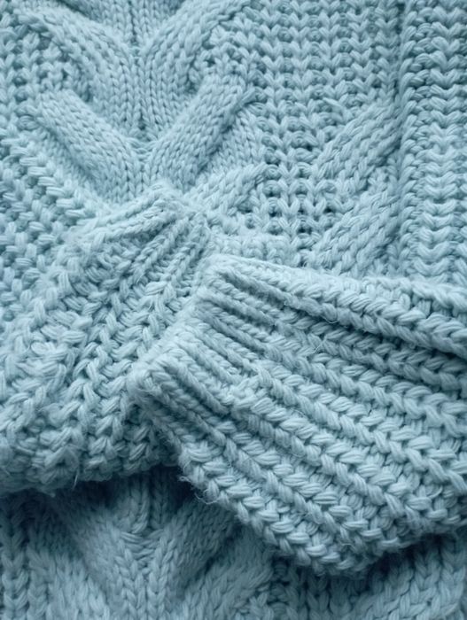 Тепленька,в'язана  кофтинка.