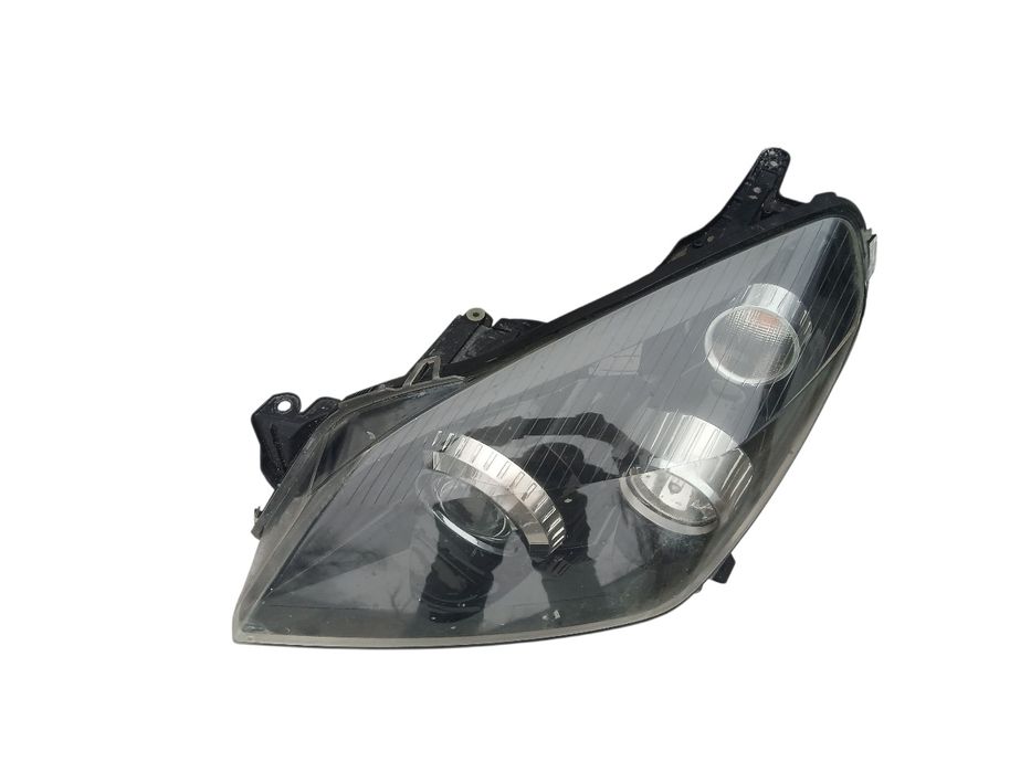Lampa przód lewa Opel Astra H BI-XENON Skrętny EUROPA Kompletna Ori