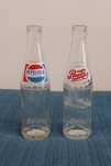 Garrafas antigas Coca-Cola e Pepsi-Cola