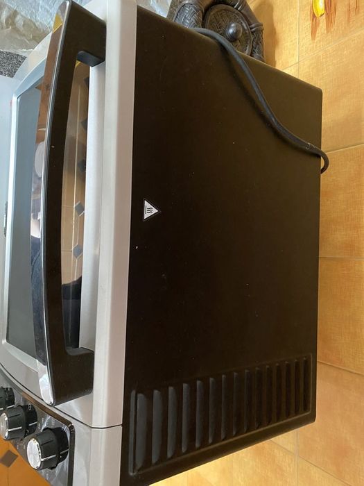 Forno portátil DeLonghi Maxi
