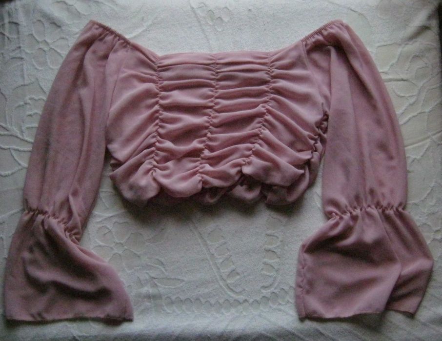 Рожевий топ з об'ємними рукавами