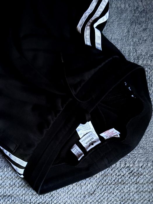 Spodnie dresowe dresy Adidas Originals Tiro czarne rozmiar XS