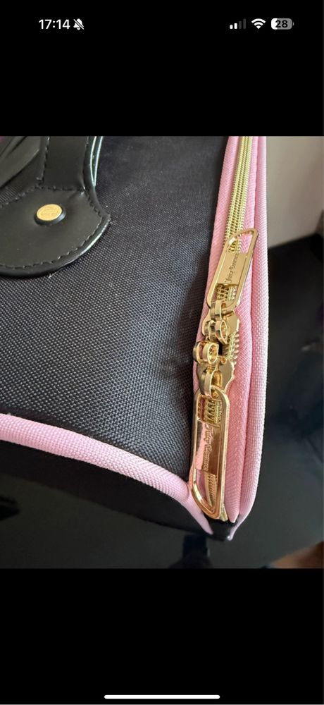 Walizka na kolkach Juicy Couture