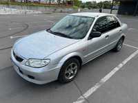 Mazda 323. 2002року. В сім'ї 10 років. Гарне авто.