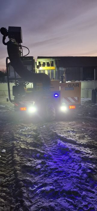 Układarka do kraweznikow samojezdna Transmanut, Probst, Optimas