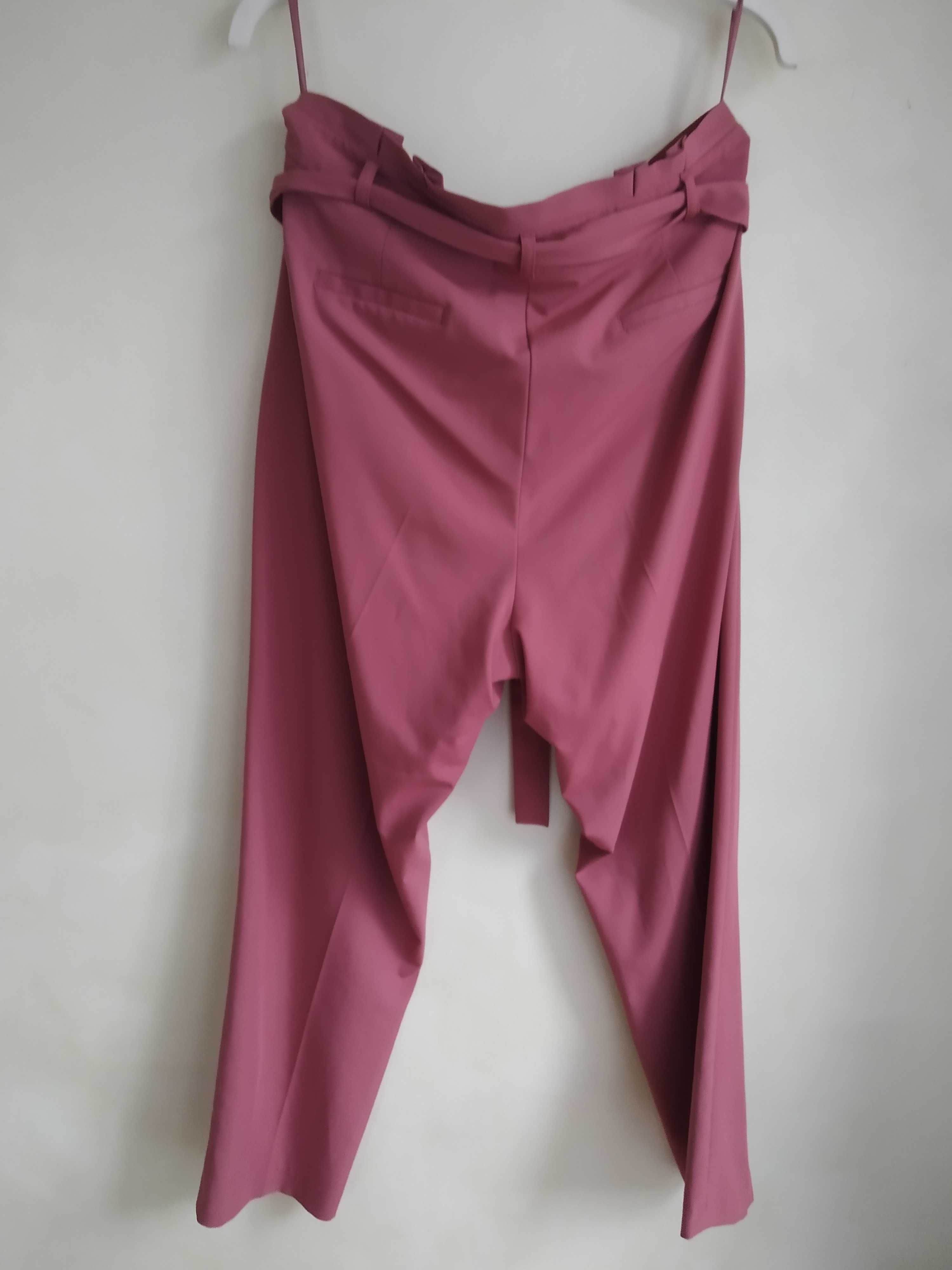 Świetne eleganckie różowe spodnie