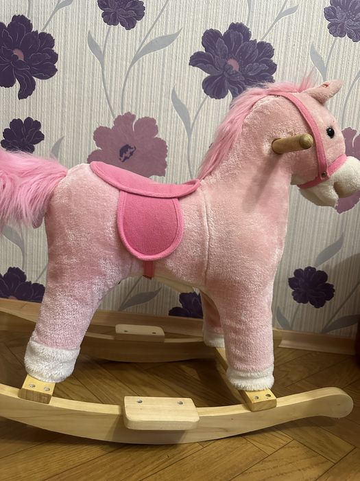 Коник гойдалка музична Рожева