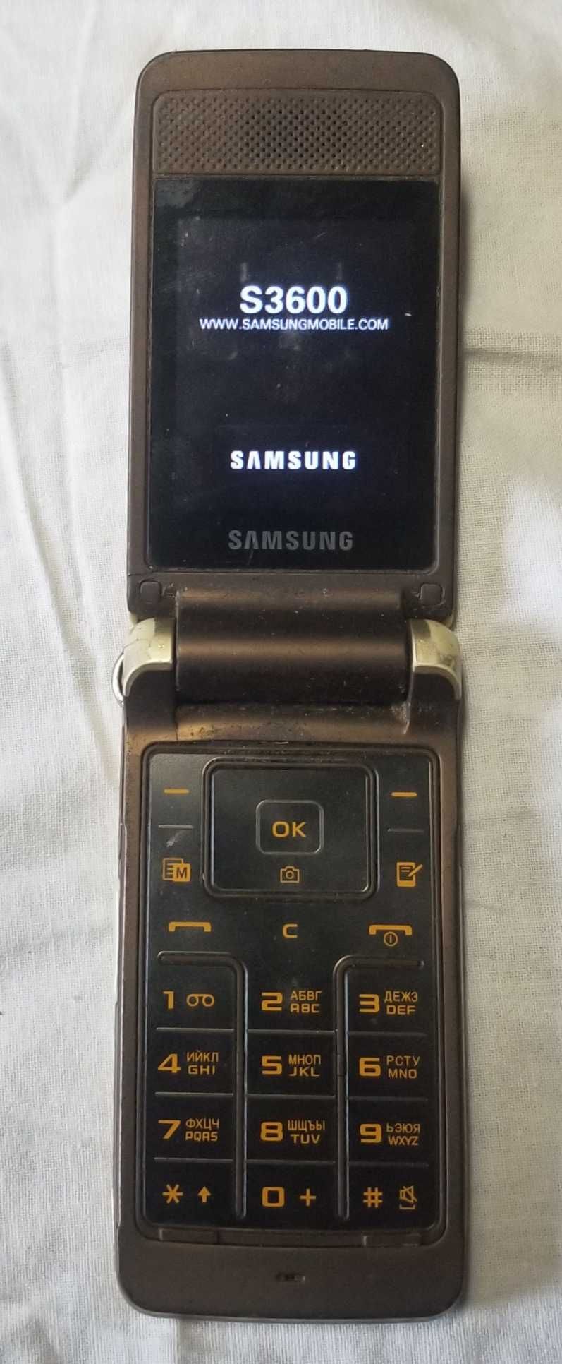 Мобильный,Samsung S3600,зарядк,фарфор, статуэтк, sharp
