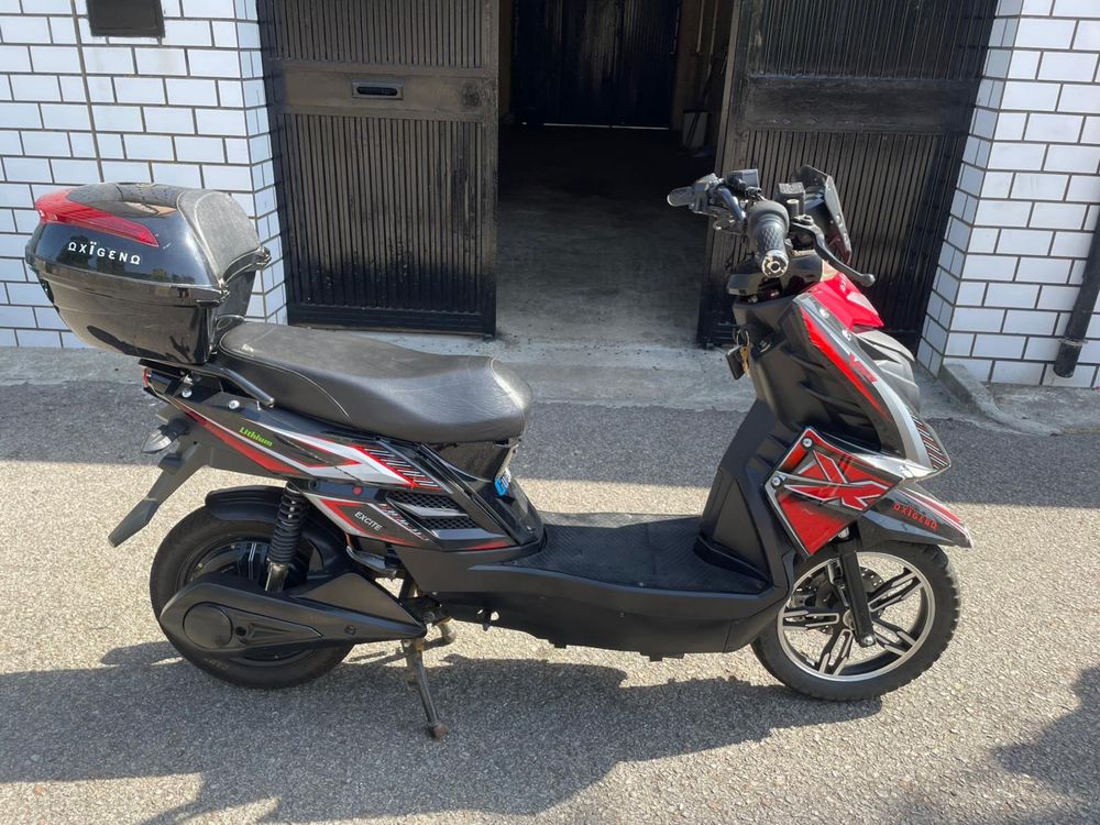 Moto electrica bateria litiu da mas o menos por volta de 30 a 40 km