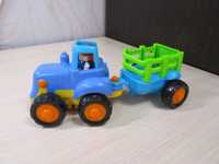 Машинка,  синий трактор с прицепом.