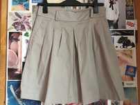 zara basic midi rozkloszowana bezowa spodnica zakladki elegancka M 38