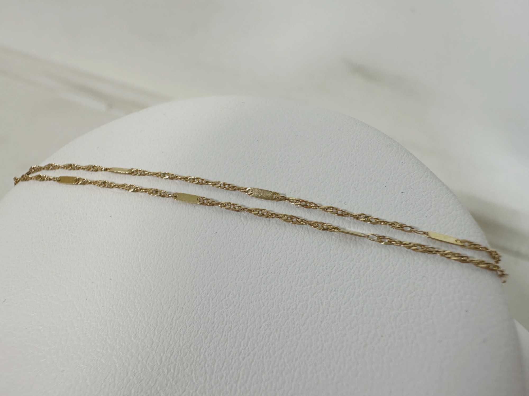 Delikatny damski złoty łańcuszek splot singapur z blaszkami 0,87G 585