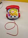 Fisher price jeżdżący telefon