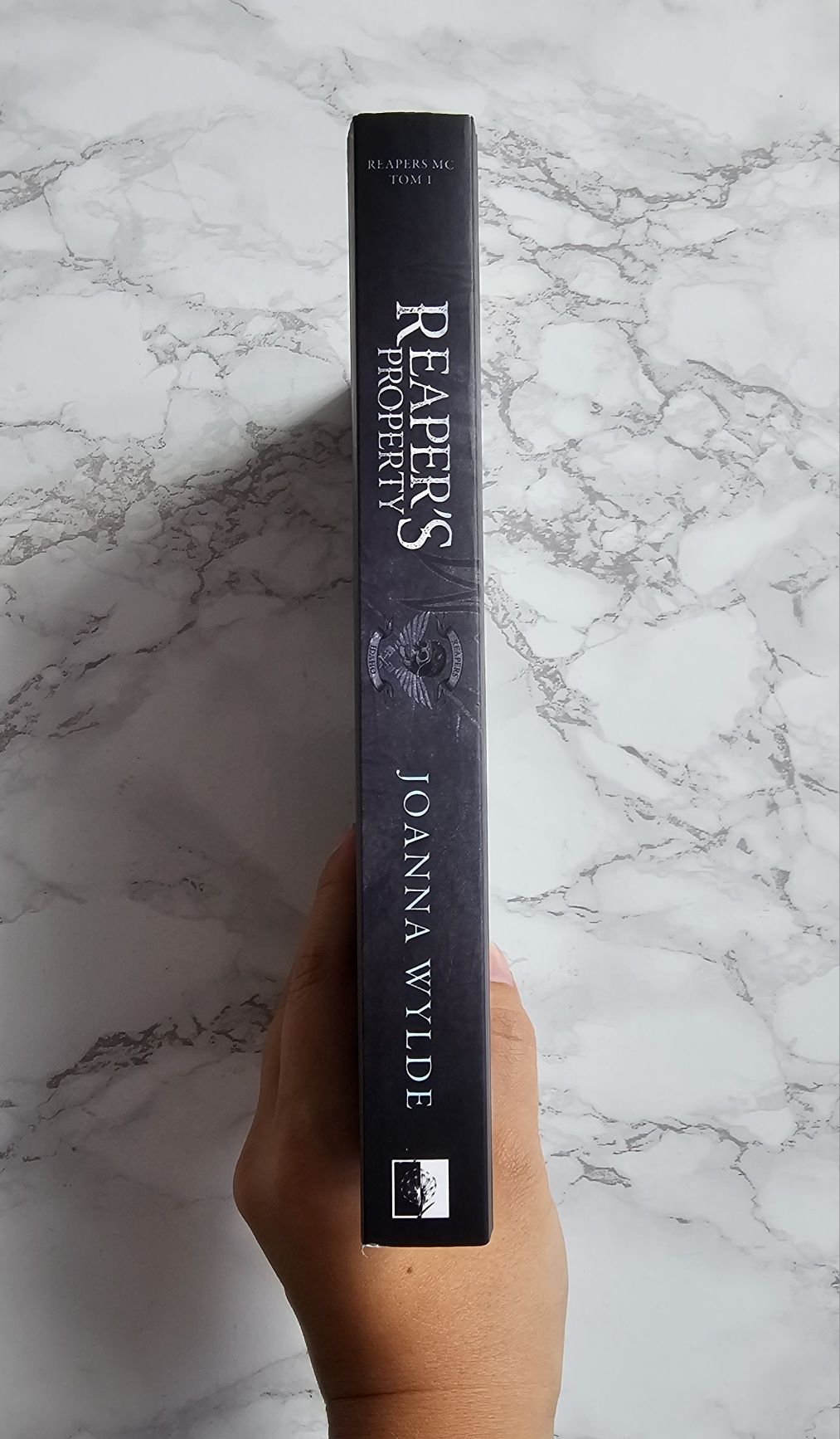Książka "Reaper's property" Joanna Wylde.