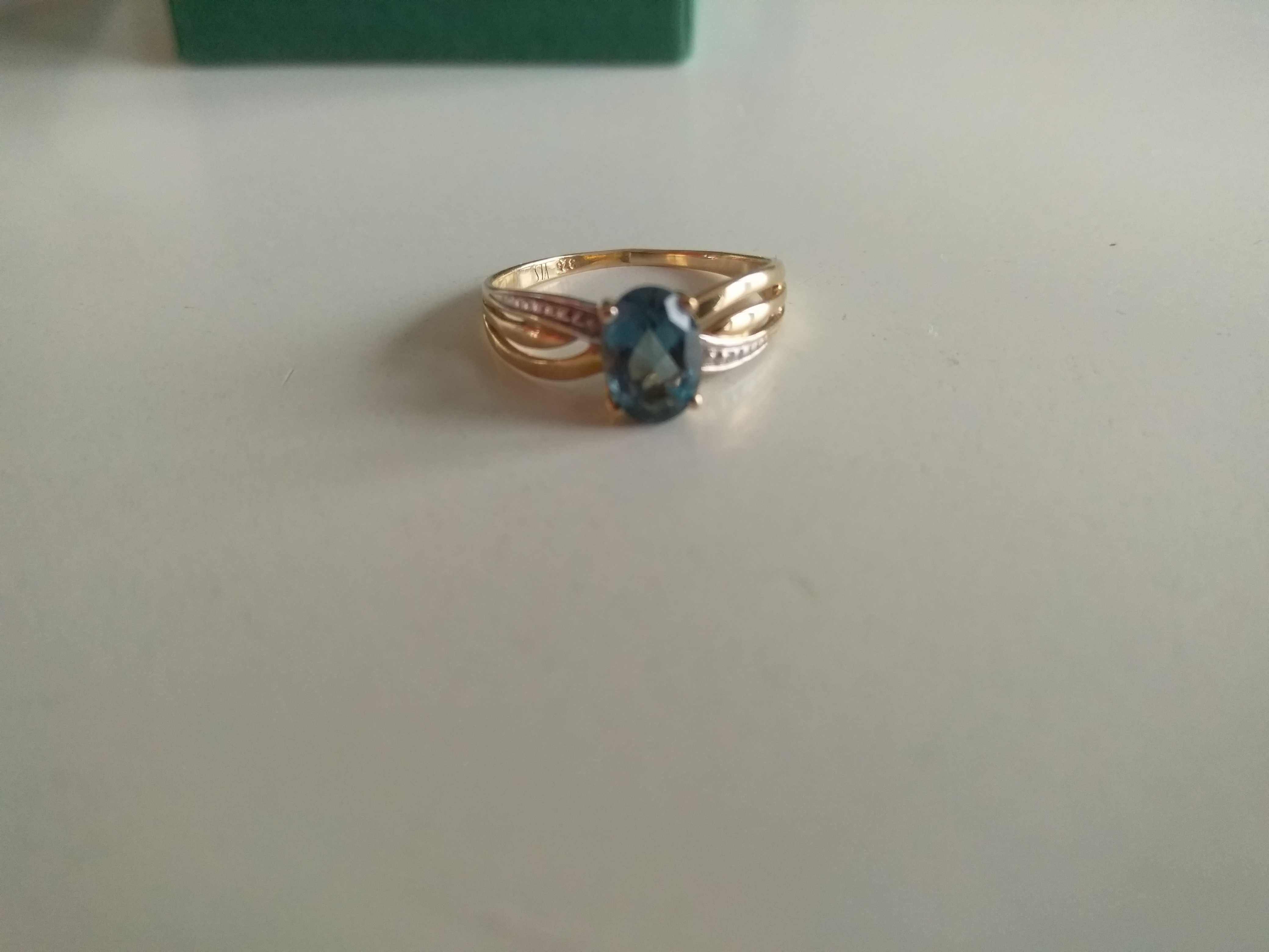 Złoty pierścionek Yes topaz London blue rozmiar 8.5