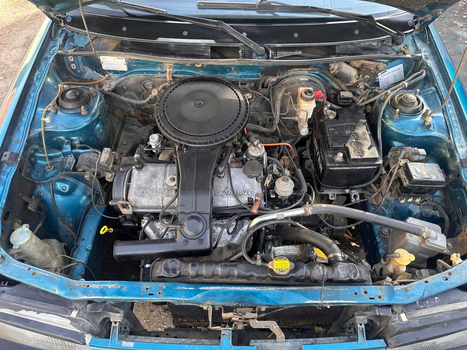 Mazda 323 расход 7л/100км