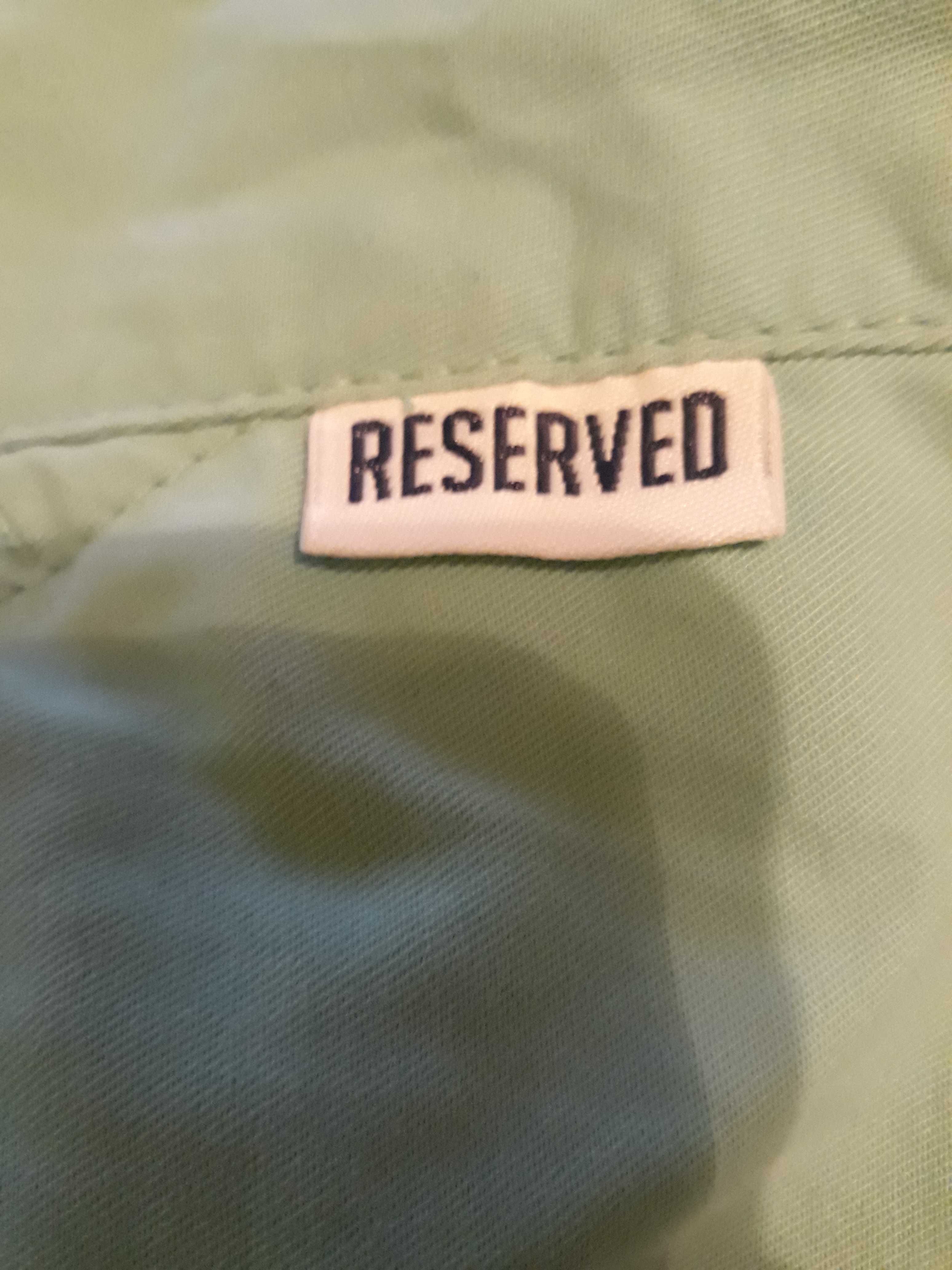 Miętowe spodnie reserved