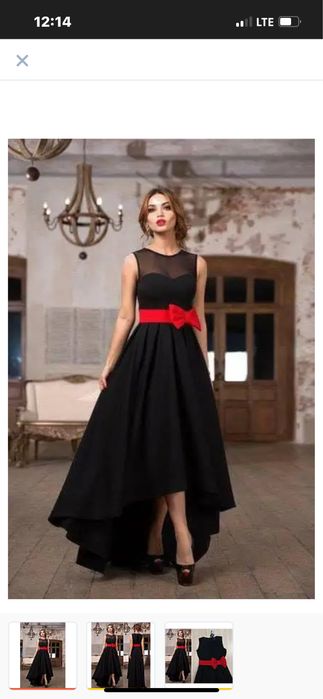 Дуже гарна сукня з червоним бантом