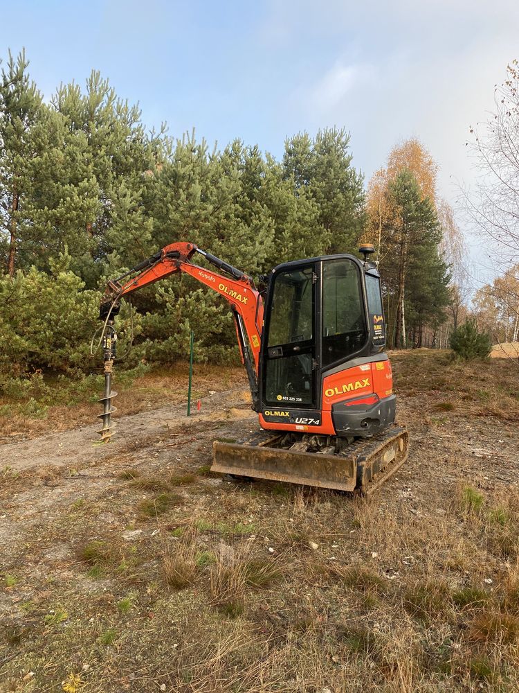 Ogrodzenia betonowe panelowe odwierty słupki, wiertnica, minikoparka