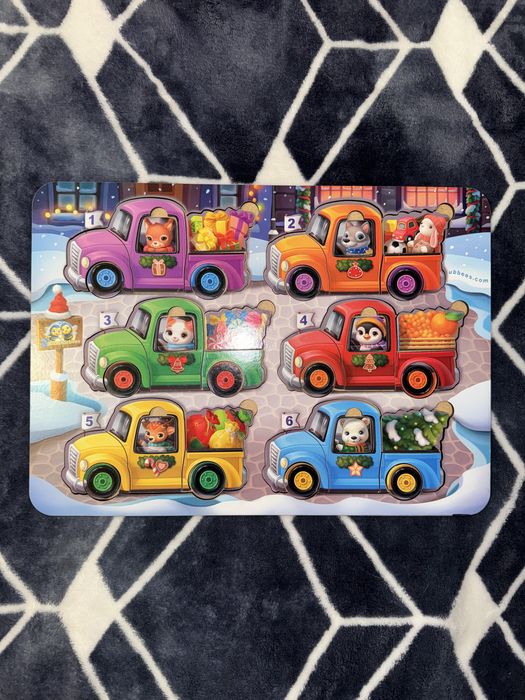 Розвиваюча гра, пазли-вкладки Тваринки на машинках.