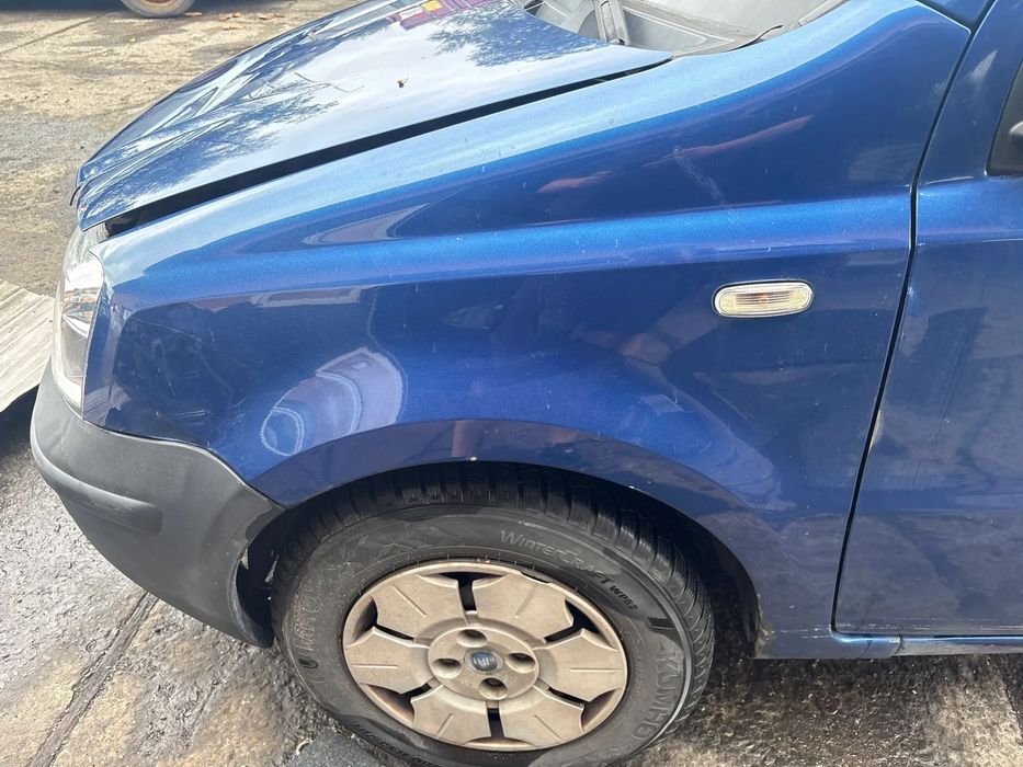 BŁOTNIK LEWY FIAT PANDA 05R 1,1B NR LAKIERU 597