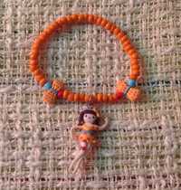 Pulseira de criança cor de laranja com boneca