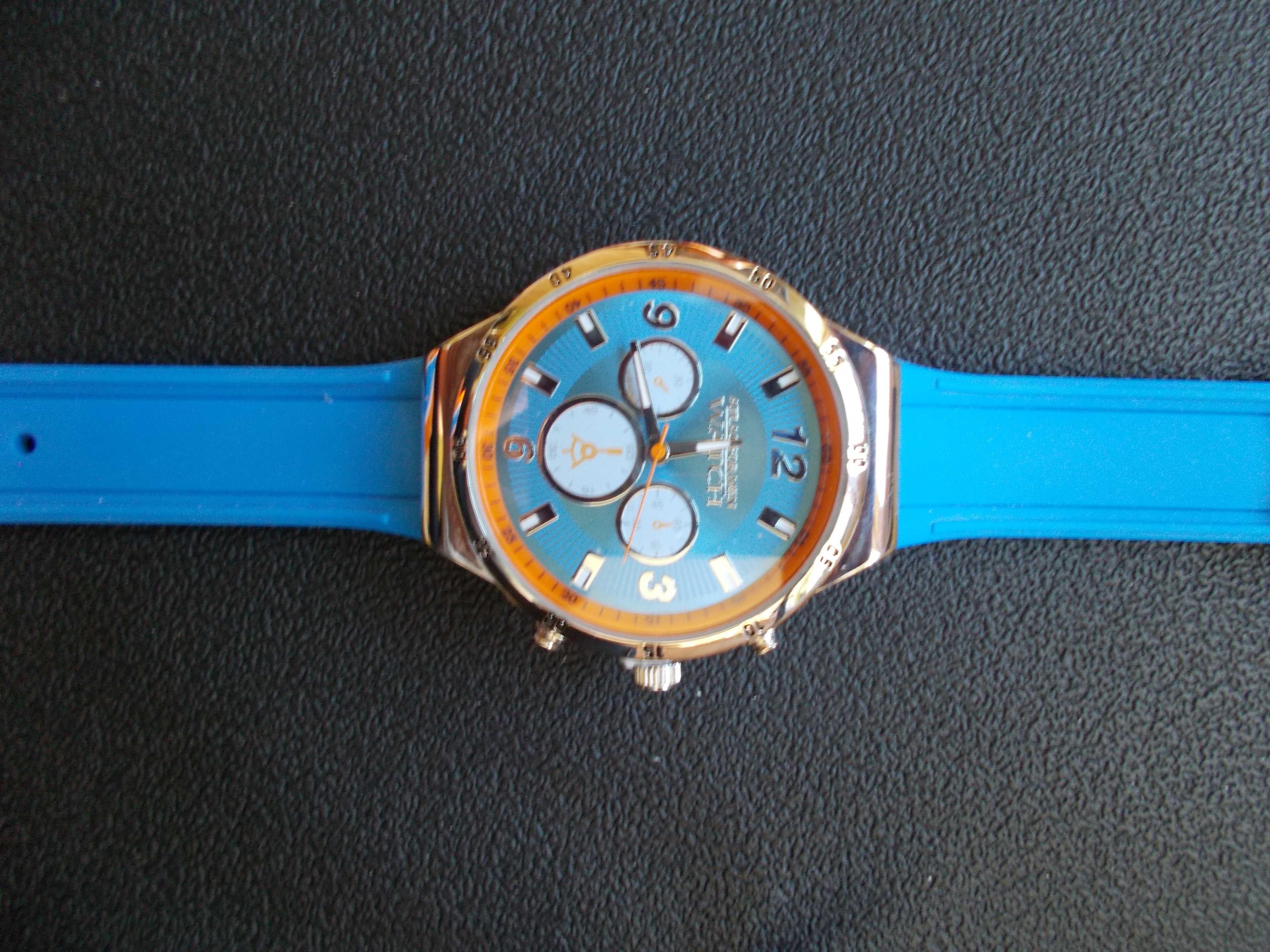 zegarek męski nowy na baterię z niebieskim paskiem,