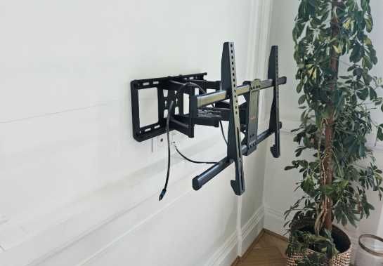 Кріплення для телевізора на стіну