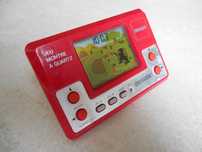 Jogo eletrónico de Bolso e Despertador Tiger Orlitronic Dinosaure