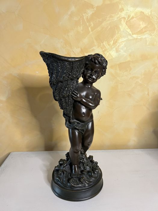 Świecznik aniołek z muszlą